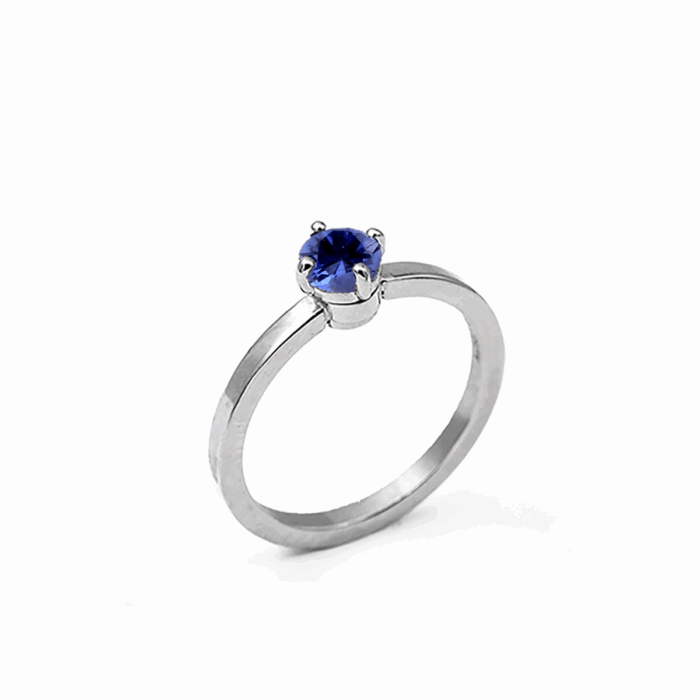 Bague en or gris & saphir bleu