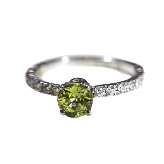 Bague en acier sertie de diamants avec Saphir vert
