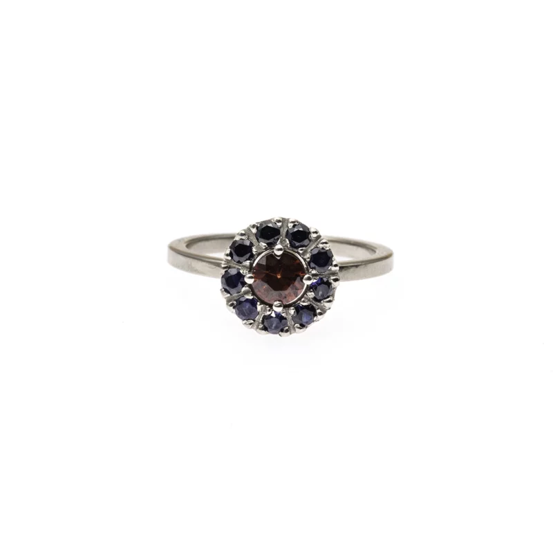 Bague or gris grenat saphirs