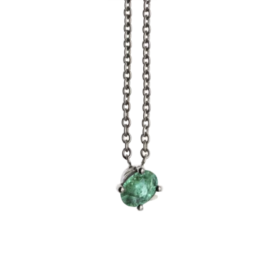 White gold and oval emerald necklace